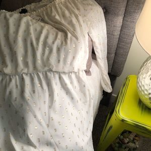 White dress with gold detail